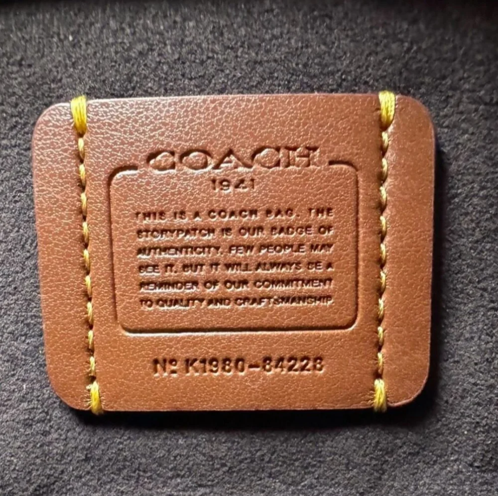 Coach 1941  Troupe 16 Signature Canvas mini satchel